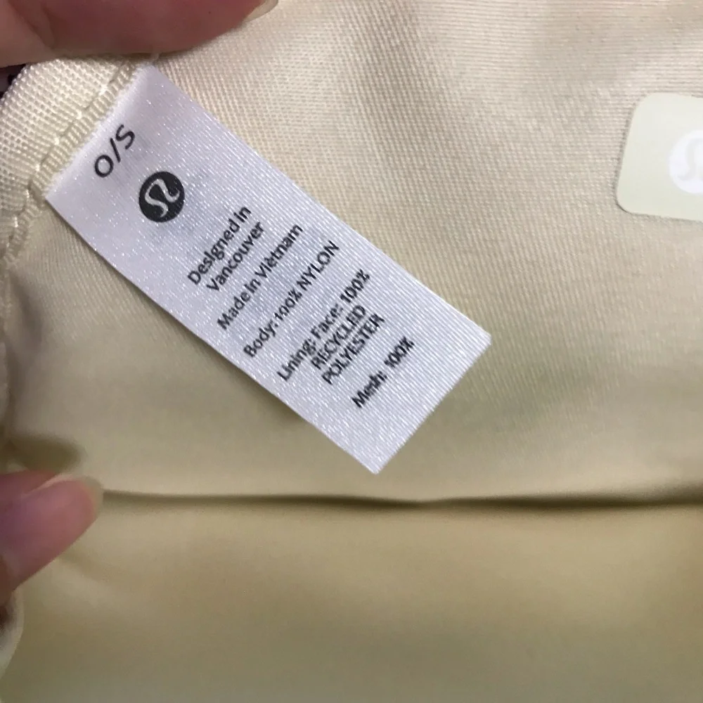 lululemon athletica cream fold-over wristlet with front zip 2L